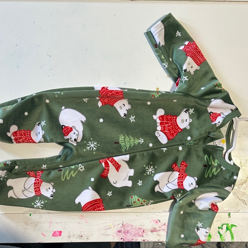 Festive Green Onesie with Polar Bear Design